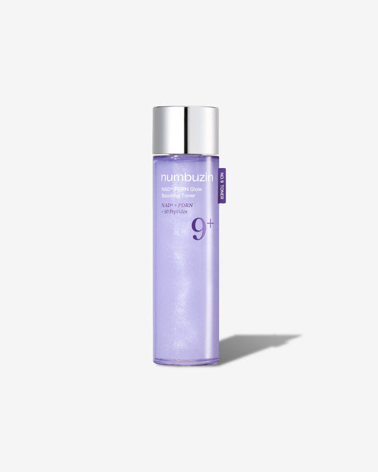 Frasco lilas do tonico facial numbuzin No.9, sobre fundo cinza claro