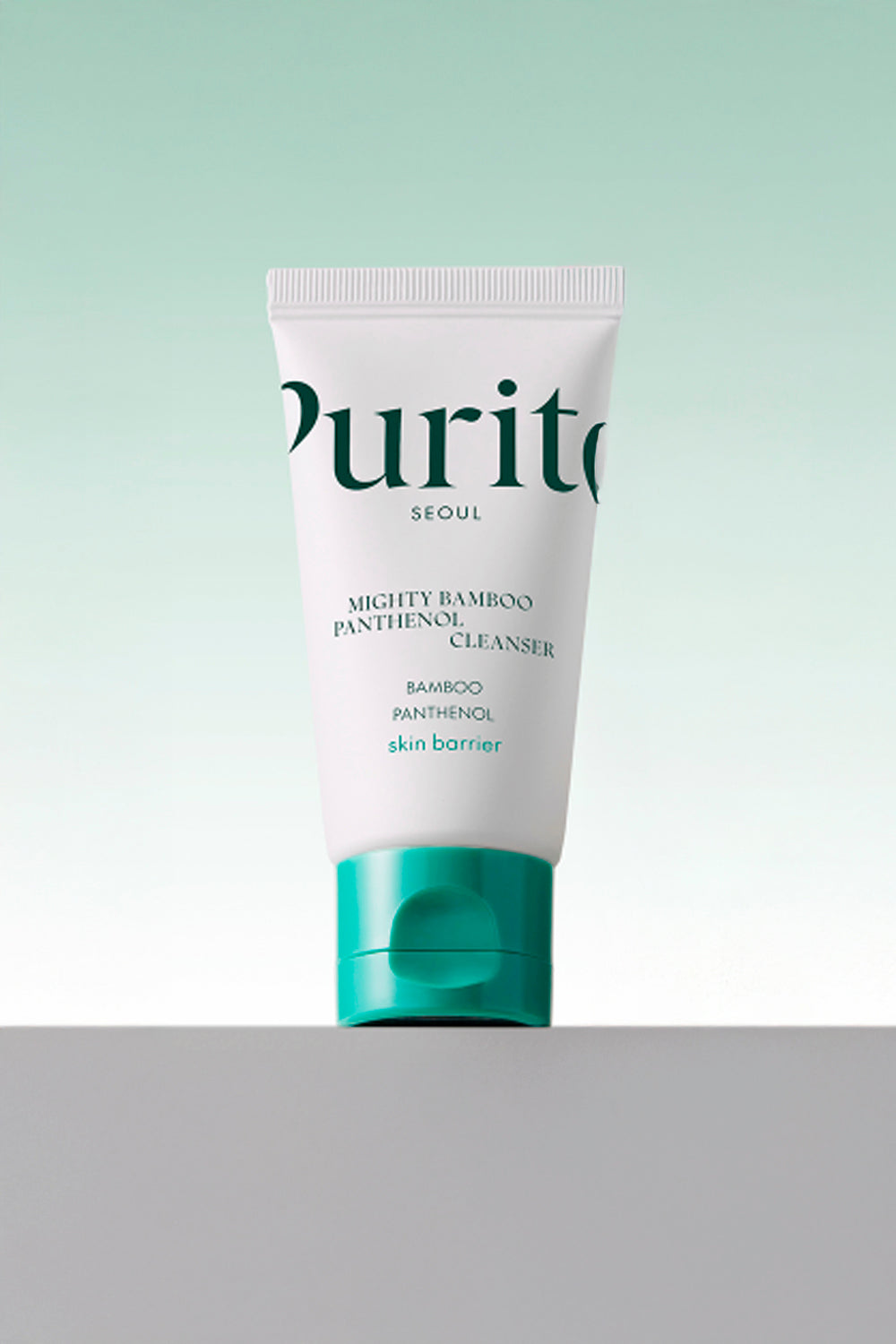 Miniatura da bisnaga Purito Mighty Bamboo Panthenol Cleanser, sobre fundo verde claro