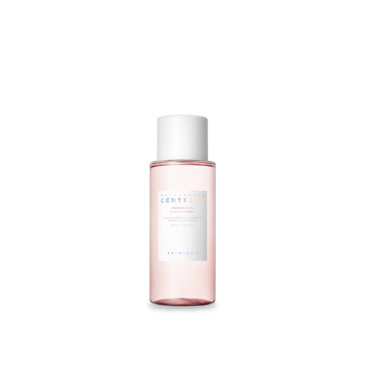 Frasco rosa do tonico SKIN1004 Madagascar Centella Poremizing Clear Toner de 210 ml, sobre fundo branco