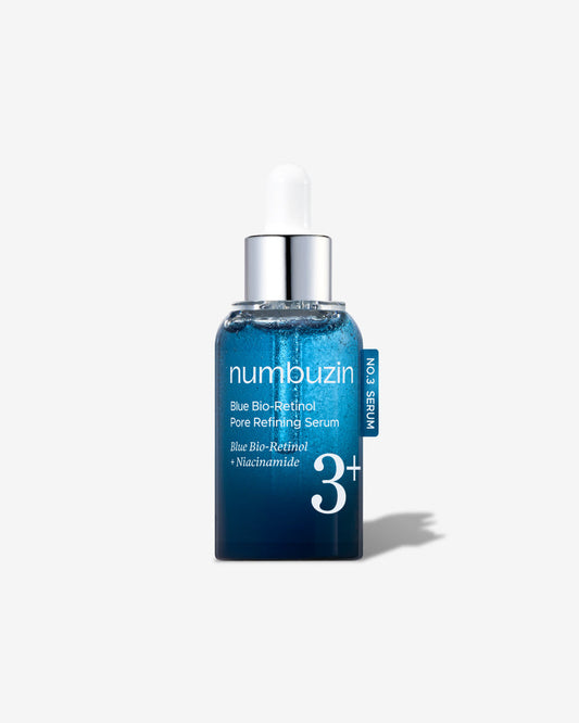 Frasco de vidro azul com conta-gotas do serum facial da linha No.3 da numbuzin, fundo cinza claro, rotulo visivel.