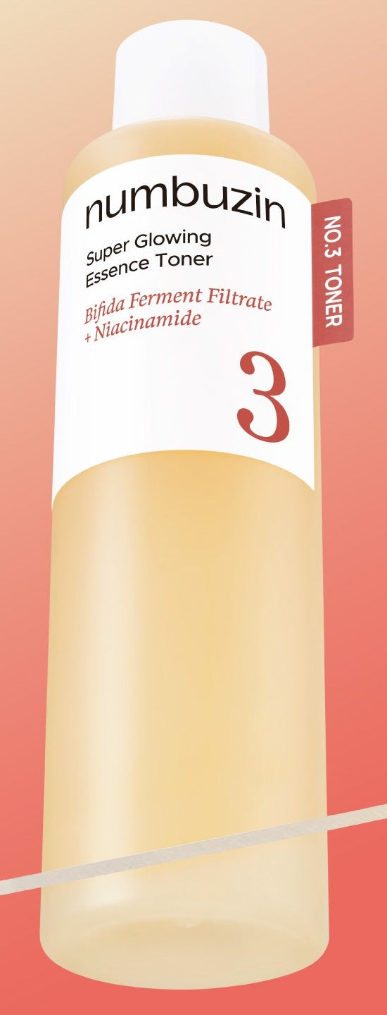 Frasco do tonico-essencia da linha No.3 da numbuzin, liquido bege, rotulo branco legivel, fundo coral.