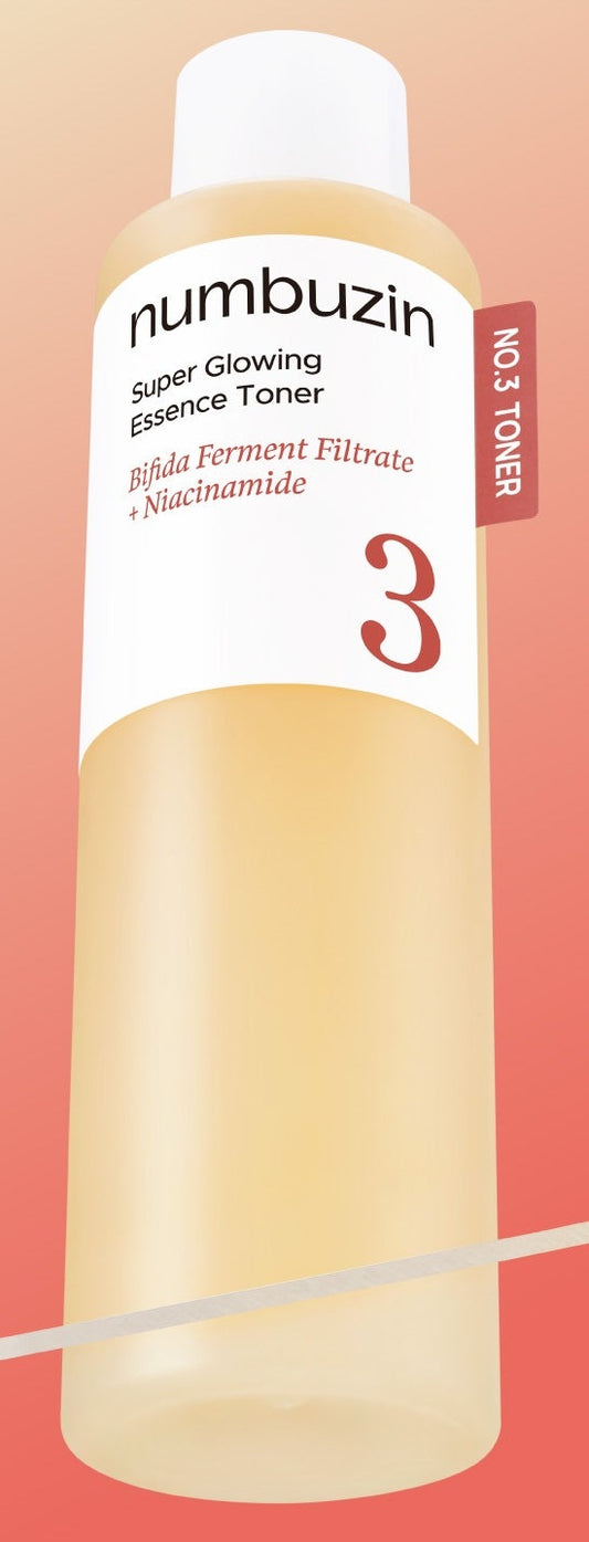 Frasco do tonico-essencia da linha No.3 da numbuzin, liquido bege, rotulo branco legivel, fundo coral.